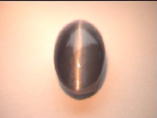 Russisches Alexandrit-Katzenauge, oval, grün-braun
