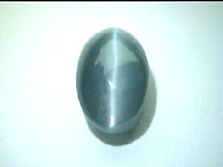 Alexandrite œil-de-chat ovale de Russie, vert et brun