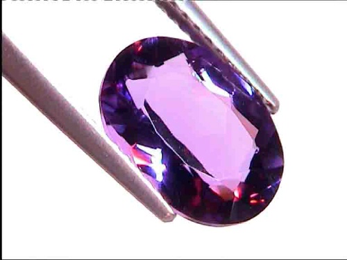 Ametista ovale viola scura dal Brasile