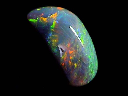 Ópalo negro de Lightning Ridge, verde-naranja, forma libre
