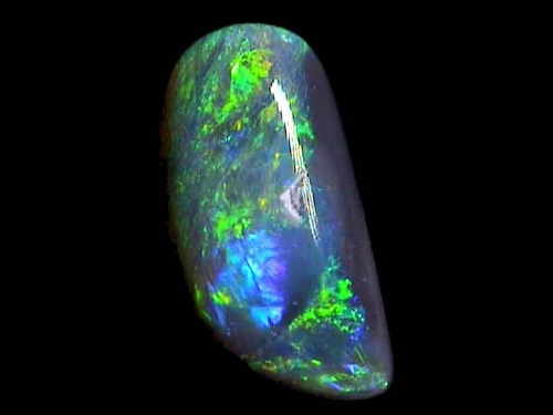 Ópalo negro de Lightning Ridge, verde-naranja, forma libre