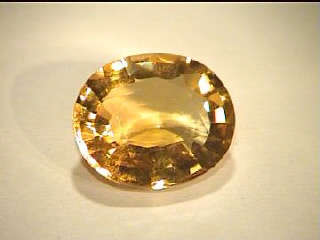 Citrino ovale brasiliano giallo-arancio