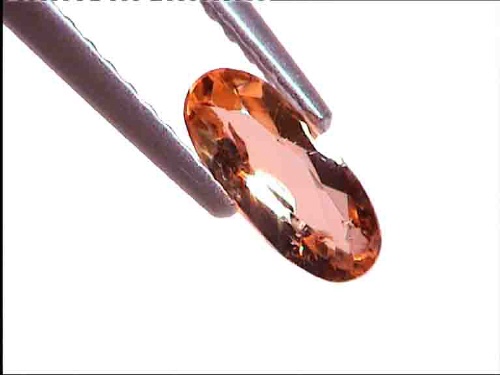 Topacio imperial dorado de talla oval, de Brasil