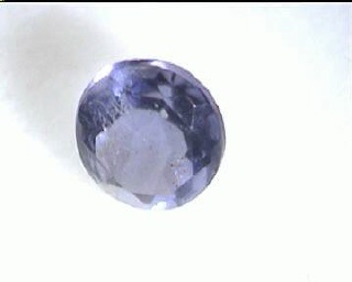 Runder grau-blauer Color-Change-Iolith aus Afrika