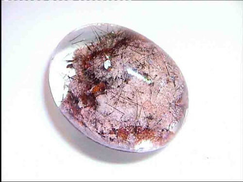 Brazilian Quartz Oval Cabochon with White-Copper Inclusions