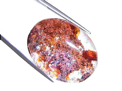 Brazilian Quartz Oval Cabochon with White-Copper Inclusions