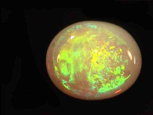 Opale di cristallo australiano ovale verde-giallo da Coober Pedy