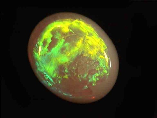 Opale di cristallo australiano ovale verde-giallo da Coober Pedy