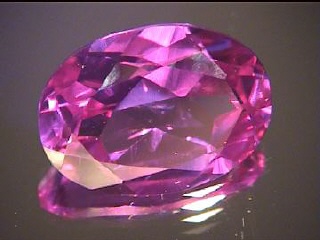 Alexandrite synthétique ovale violet/bleu-vert