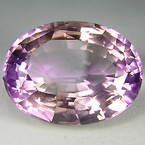 Ametrino ovalado de Bolivia en violeta claro y naranja