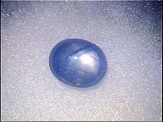 Zaffiro stellato argento e blu, cabochon ovale dalla Thailandia