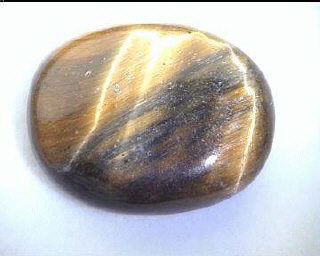 Ojo de tigre ferroso de Australia, cabujón ovalado