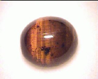 Ojo de tigre australiano naranja y marrón, cabujón ovalado